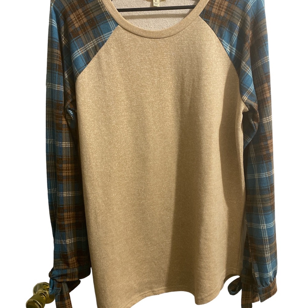 Women’s plaid top.